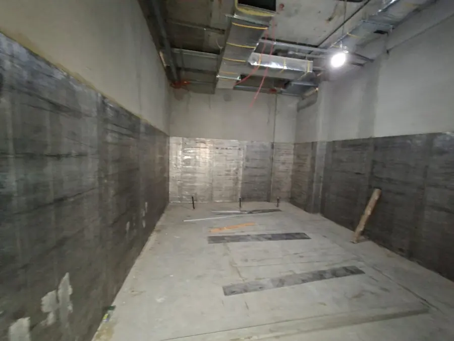 Radiation-shielded room with lead sheet fixed to the walls, before finishes