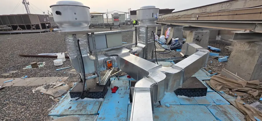 Rooftop ductwork and exhaust fans during installation